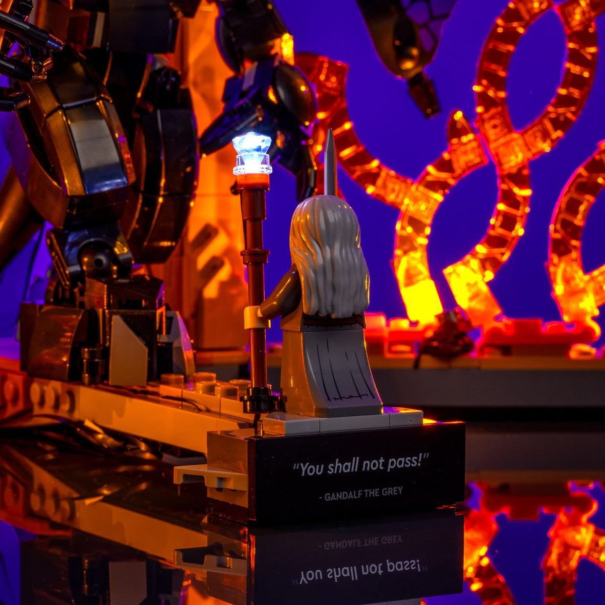 Gandalf's staff pulsing with cool white light on the LEGO® Bridge of Khazad-dûm