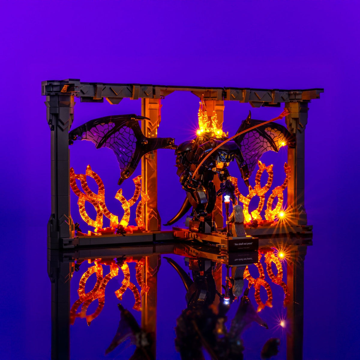 Illuminated confrontation between Gandalf and the Balrog on the LEGO® Bridge of Khazad-dûm