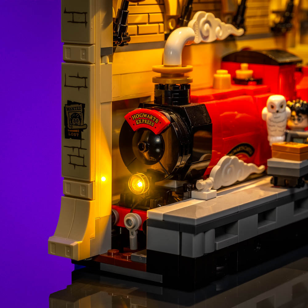 Yellow illuminated headlight on the Hogwarts Express locomotive