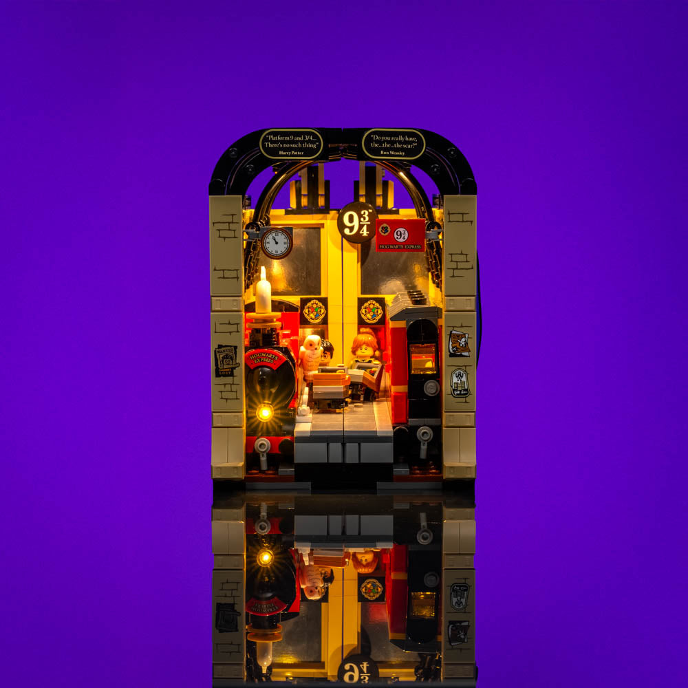 Closed illuminated book nook featuring Platform 9¾ and the Hogwarts Express