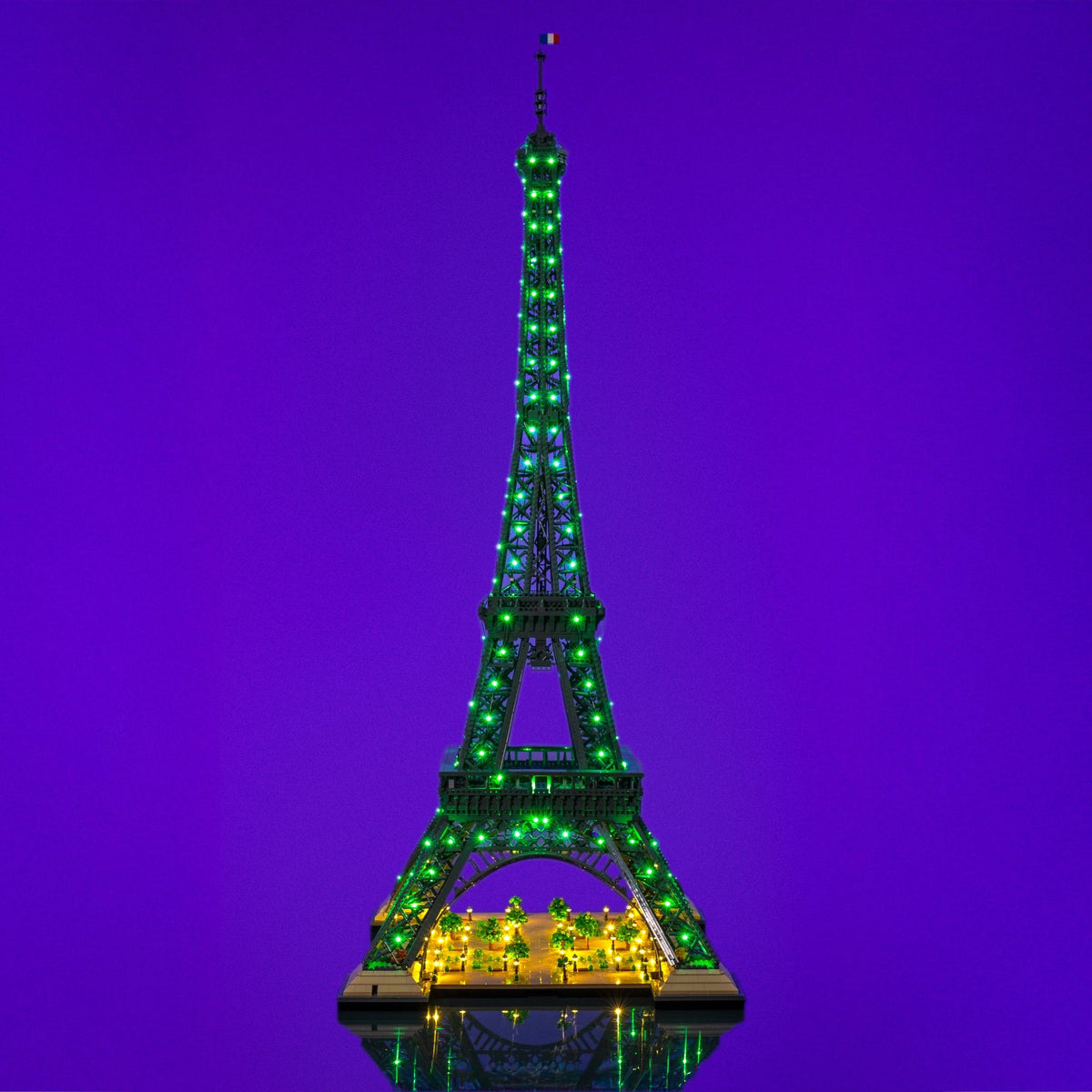 Green illuminated LEGO® Icons Eiffel tower using the RGB colour system