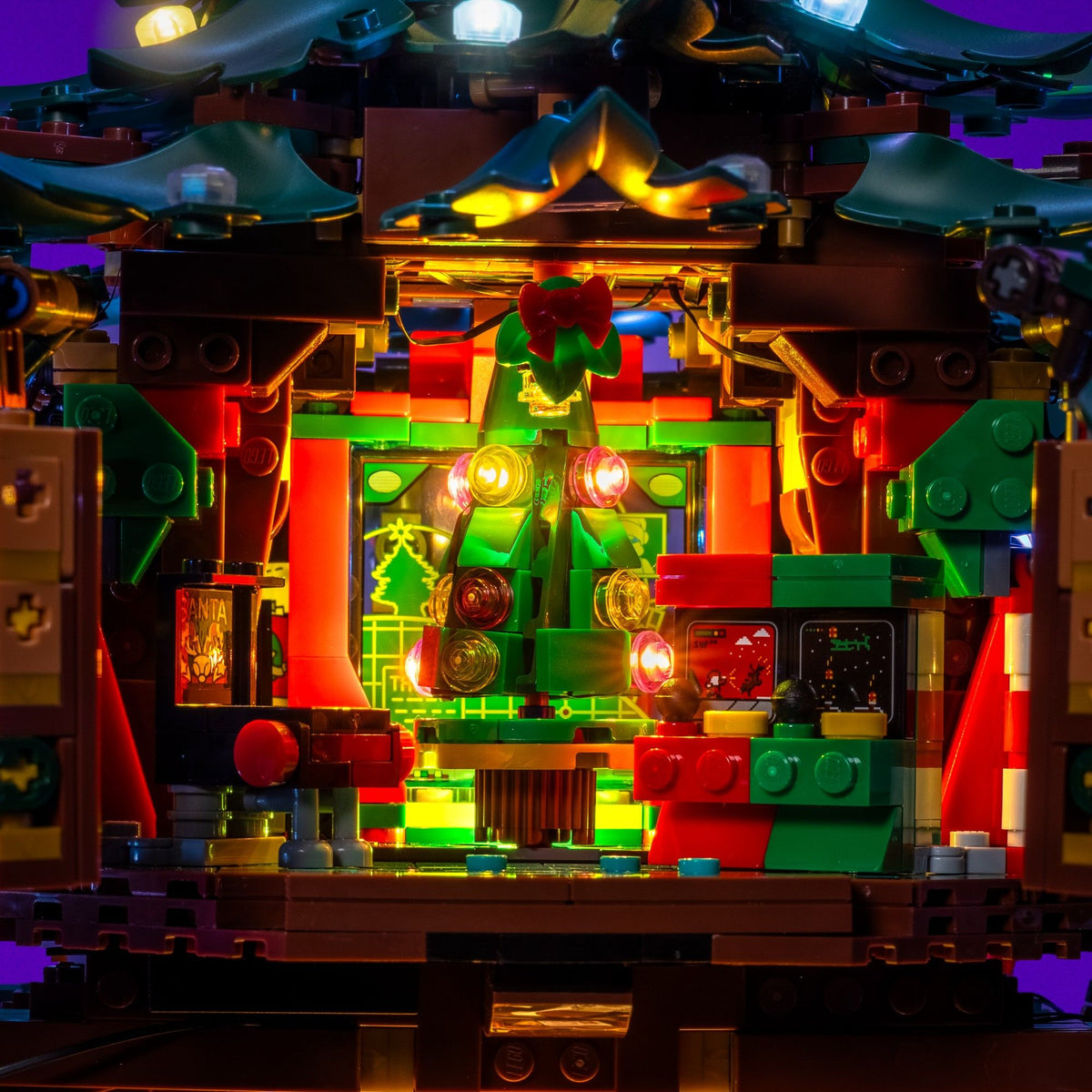 Illuminated miniature tree and control room inside the LEGO® Family Christmas Tree