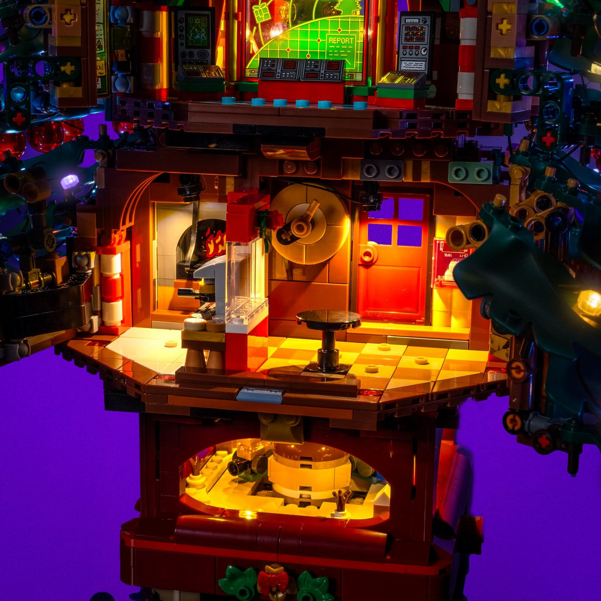 Warmly illuminated kitchen and rooms inside the LEGO® Icons Family Christmas Tree