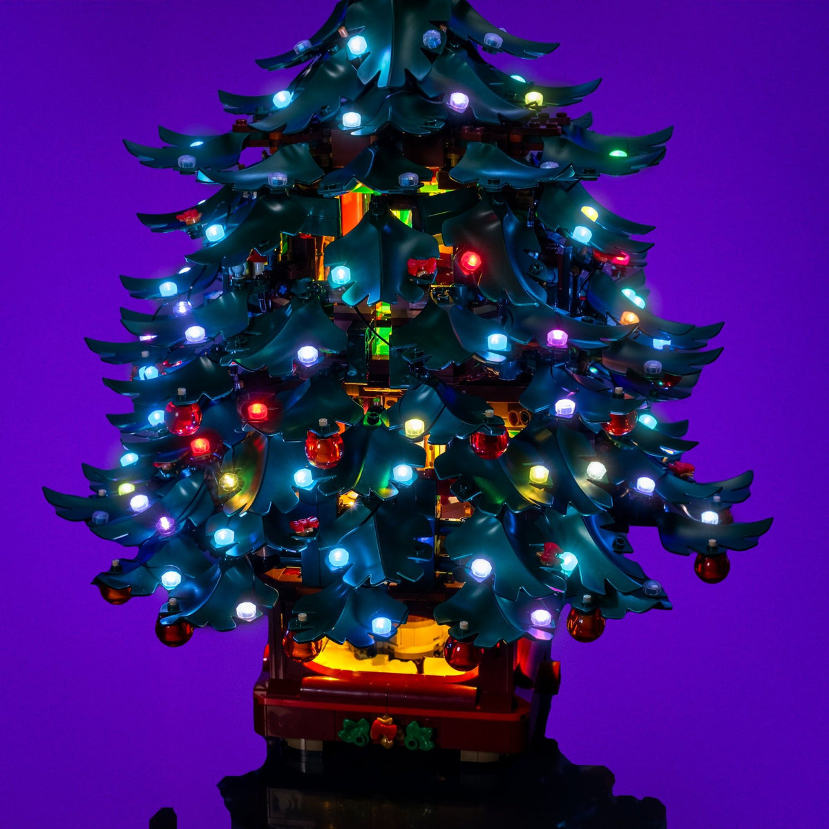 Multicoloured fairy lights across the LEGO® Icons Family Christmas Tree