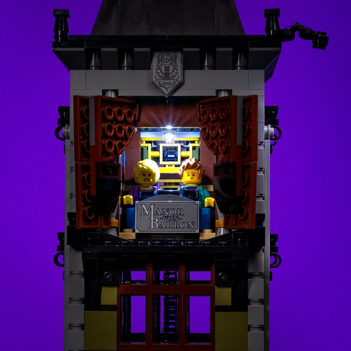 Illuminated elevator inside the LEGO® Icons Haunted House