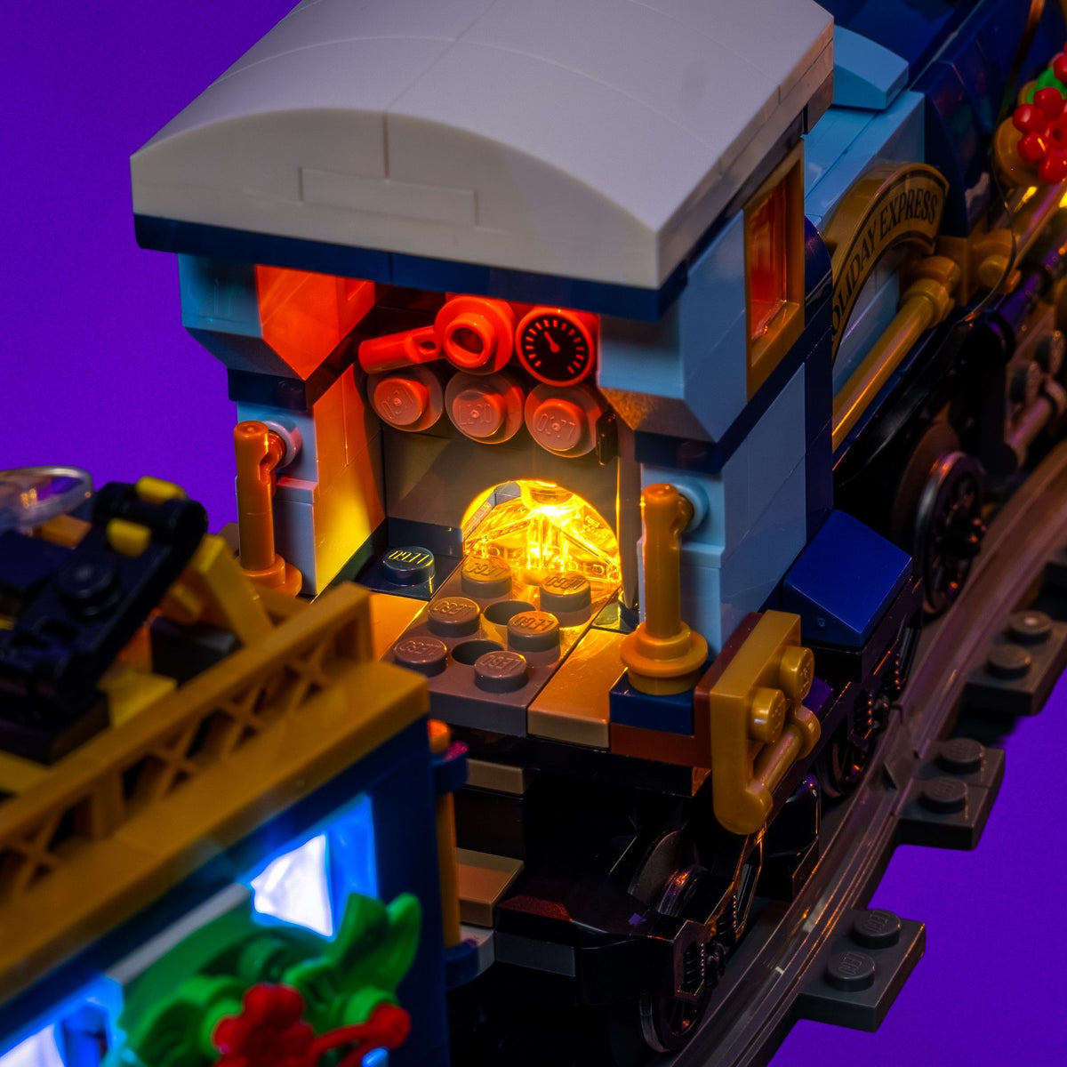 Orange flickering firebox inside the LEGO® Icons Holiday Express Train locomotive