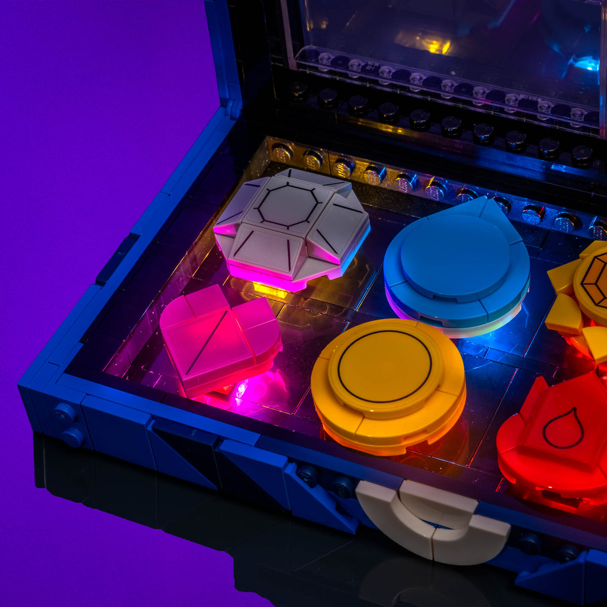 Medaglie Pokémon illuminate con un effetto simile a pietre preziose